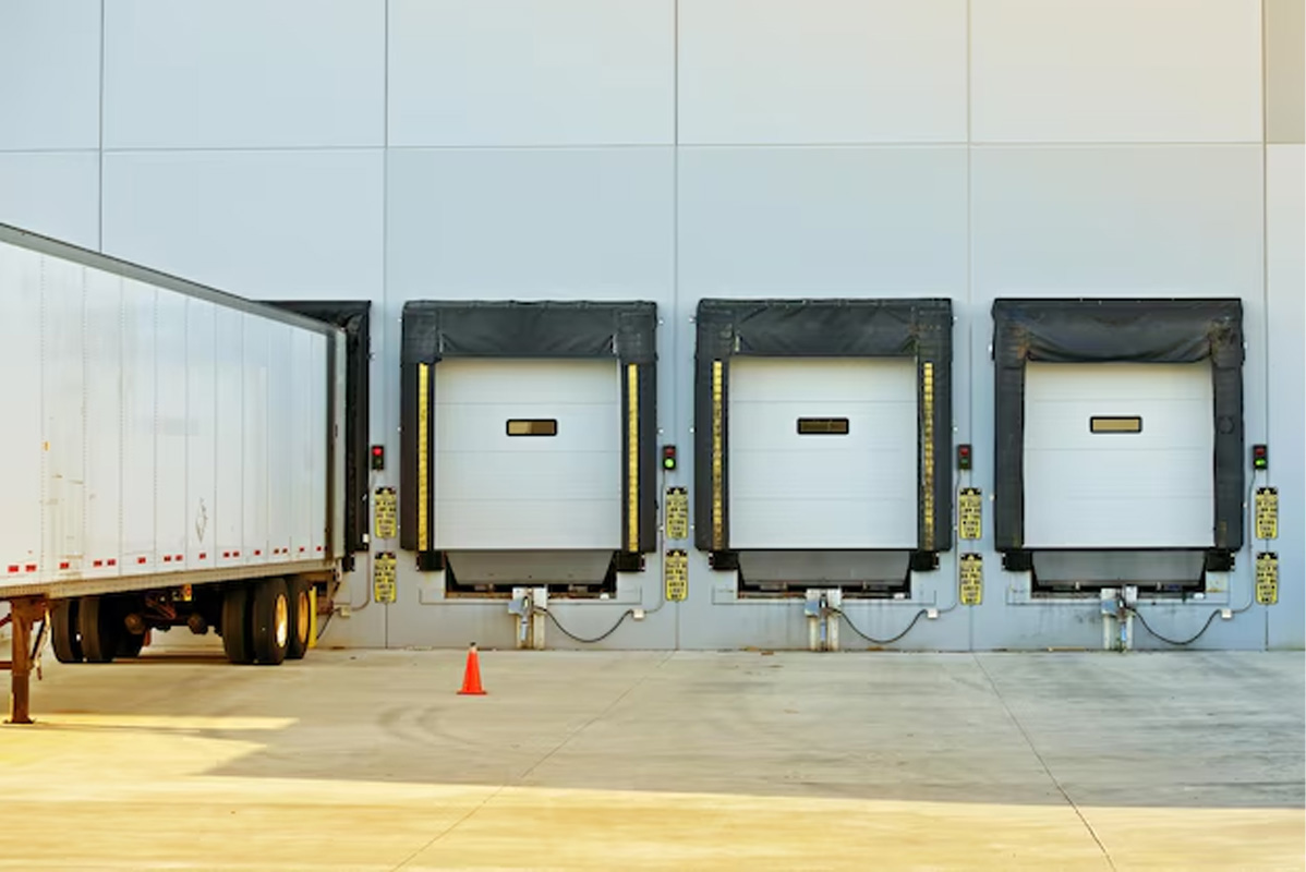 freight-shipping-dock-with-one-semi-trailer-and-three-empty-doors